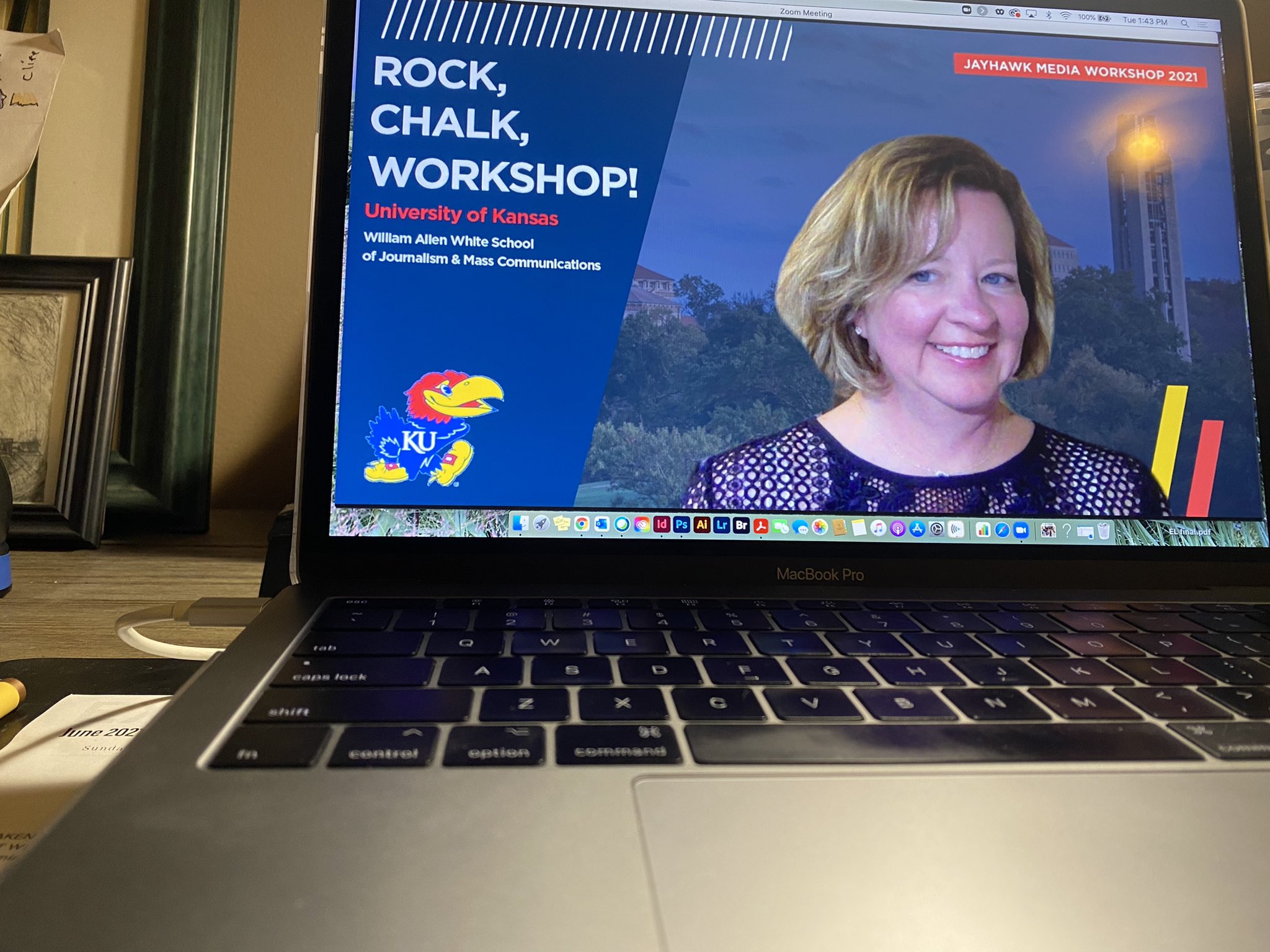 Laptop with Jayhawk Media workshop website on screen