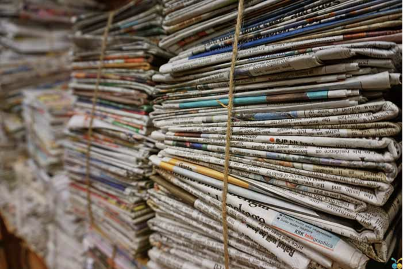 Bundles of tied newspapers