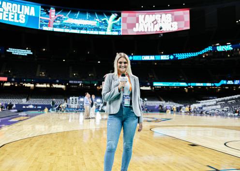 Olivia Micek standing on the court in the Superdome in April 2022.