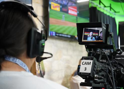 Student operates camera