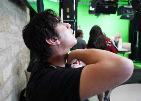 student putting mic on