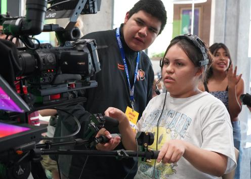 Students operate the camera
